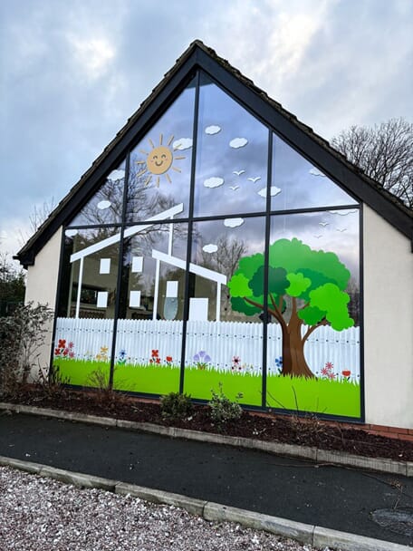 An image of the nursery's window and door graphics.